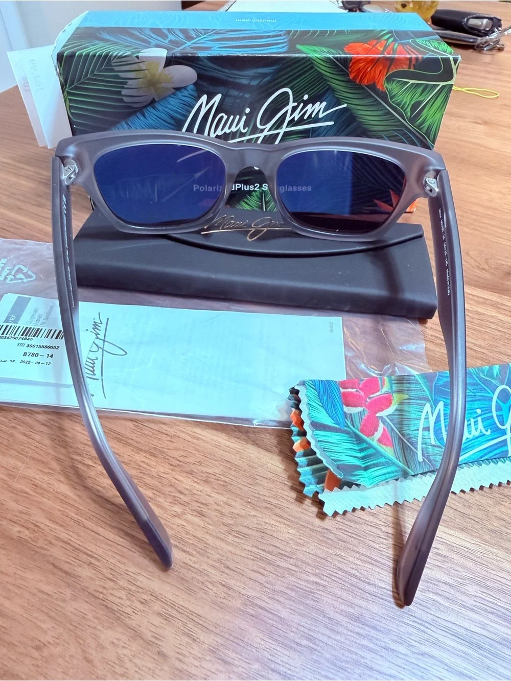Maui Jim Sunglasses with Blue Lenses and Translucent Gray Frame
